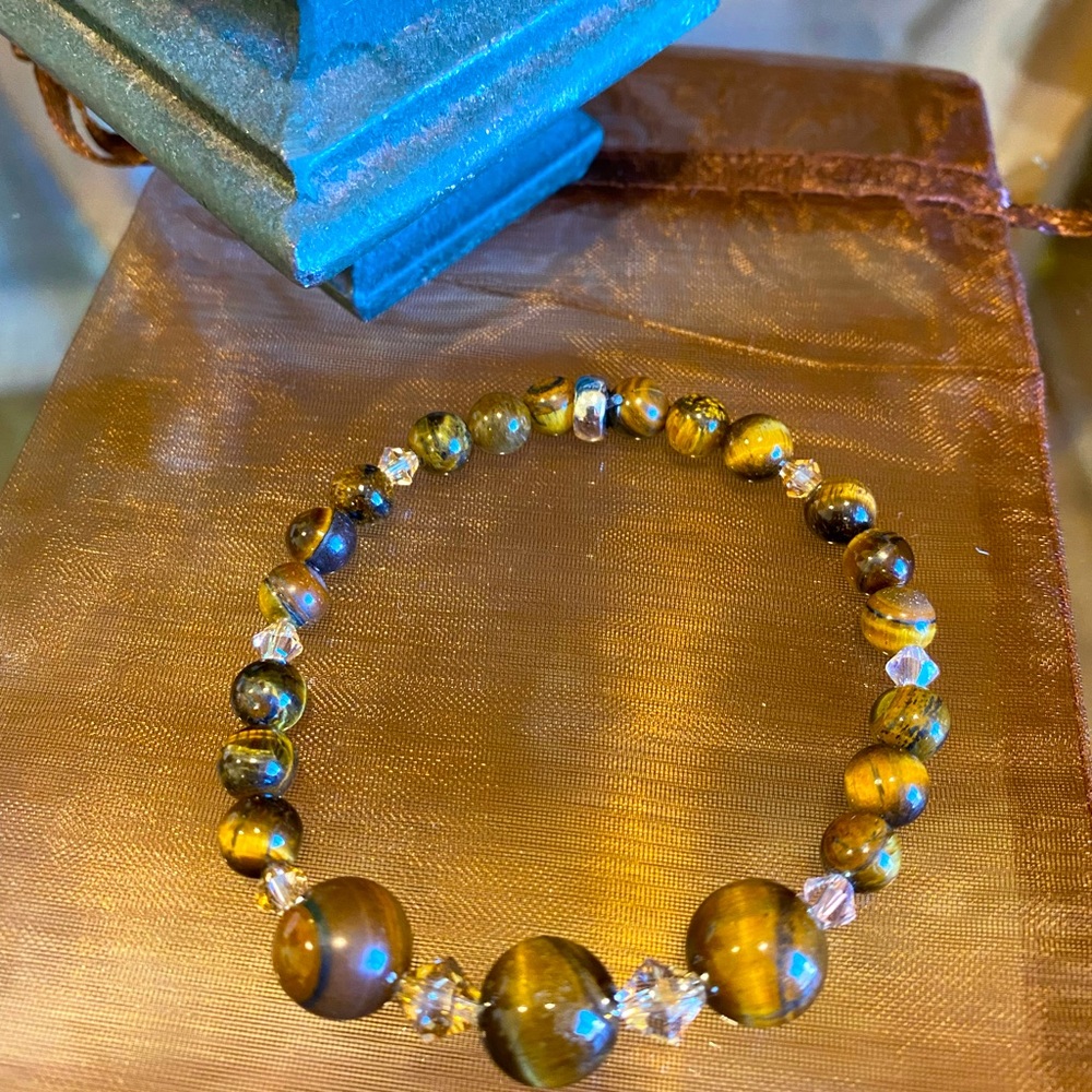Private label handmade Tiger Eye bracelet with beige Swarovski crystals.SZ small
